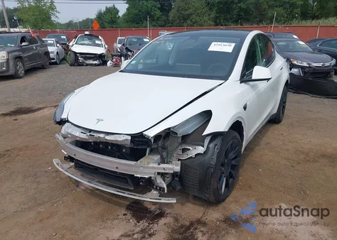 2023 Tesla Model Y Awd/Long Range Dual Motor All-Wheel Drive из США, поврежденный, VIN 7SAYGDEE1PF765193